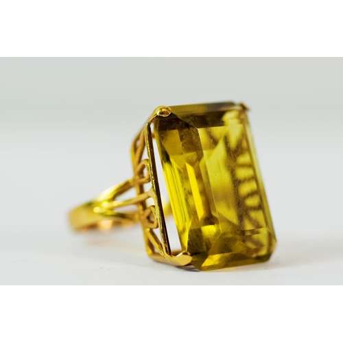 223 - Large Emerald cut Citrene which measures 20 X 15 mm mounted on a 9ct Yellow Gold cage style shank.  ... 