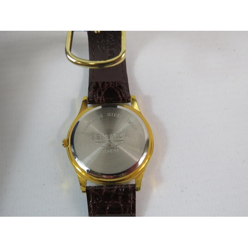 224 - Sekonda Water resistant quartz watch, Stainless steel back with patent leather strap. Original box. ... 