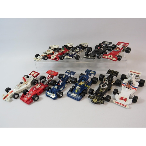 542 - 11 Corgi formula 1 diecast cars 1:36 scale.