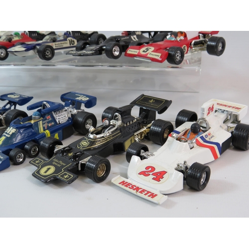 542 - 11 Corgi formula 1 diecast cars 1:36 scale.