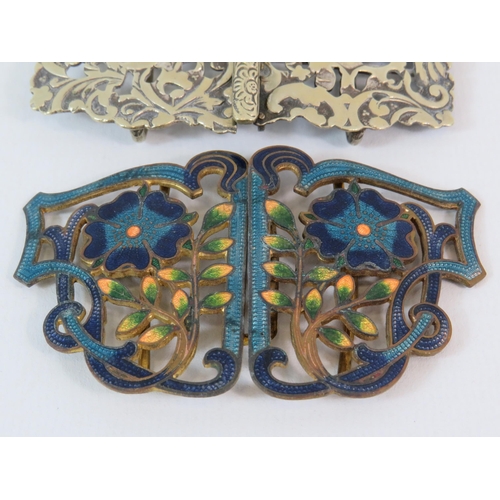 552 - 2 Vintage belt buckles, 1 is gilt metal with enamel flowers the other being white metal.