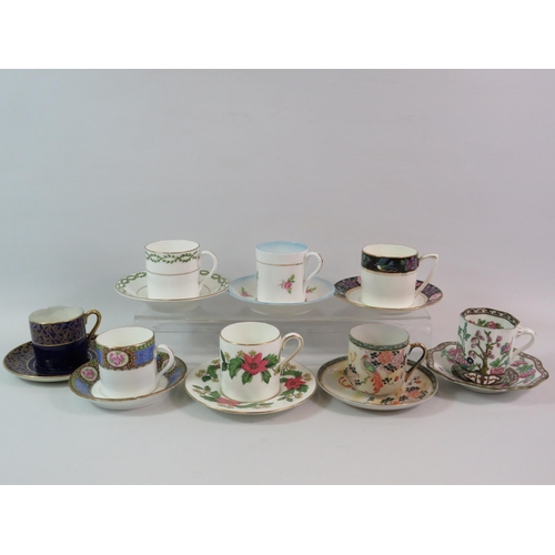 595 - 8 China coffee cans and saucers, makers include Coalport, Wedgwood, Crown Devon etc