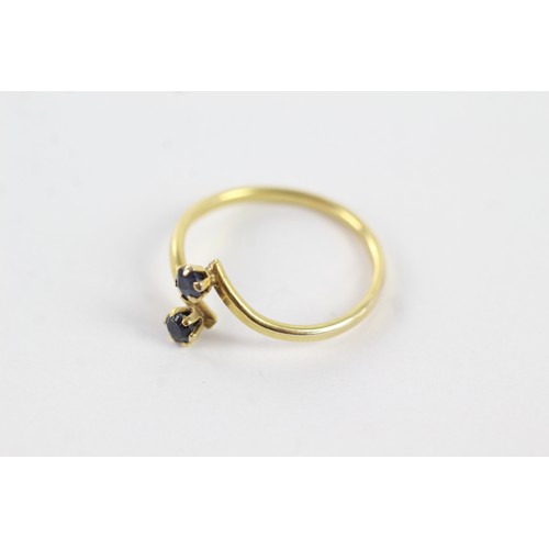 256 - 9ct gold sapphire twin stones twist setting ring (1.3g)    755004