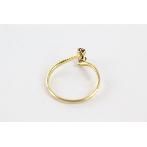 256 - 9ct gold sapphire twin stones twist setting ring (1.3g)    755004