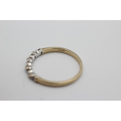 257 - 9ct gold diamond half-eternity ring (1.5g)    754997