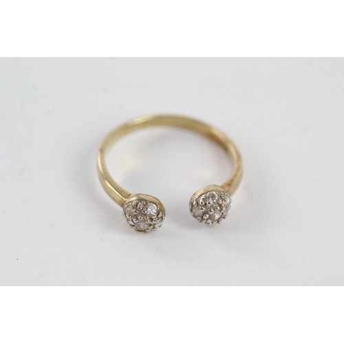 260 - 9ct gold diamond double cluster split shank ring (2g)    755009