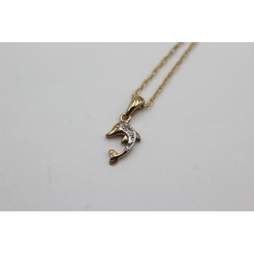 284 - 9ct gold diamond set dolphin pendant necklace (1.2g)    754509