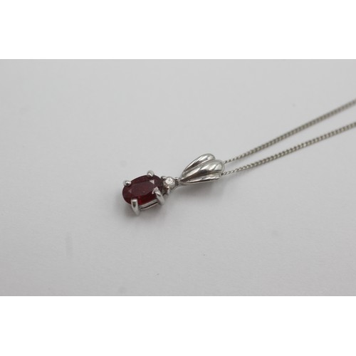 286 - 9ct white gold ruby & diamond pendant necklace (1.5g)     754511