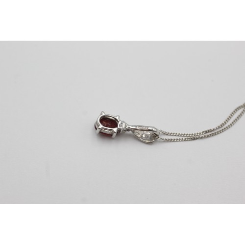 286 - 9ct white gold ruby & diamond pendant necklace (1.5g)     754511