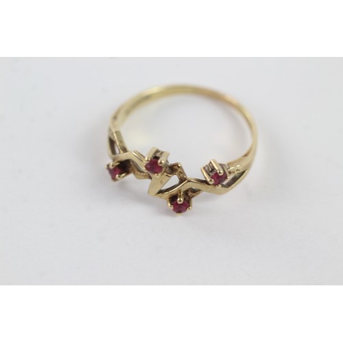 291 - 9ct gold ruby set stylised setting dress ring (2.3g)    755010