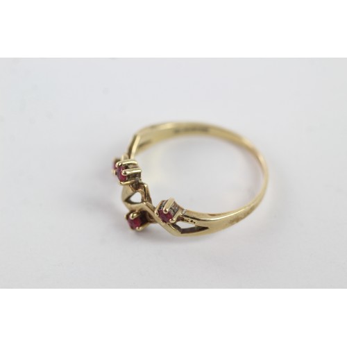 291 - 9ct gold ruby set stylised setting dress ring (2.3g)    755010