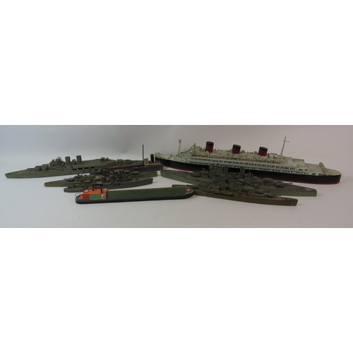 669 - Selection of handmade wooden boats, war ships etc.