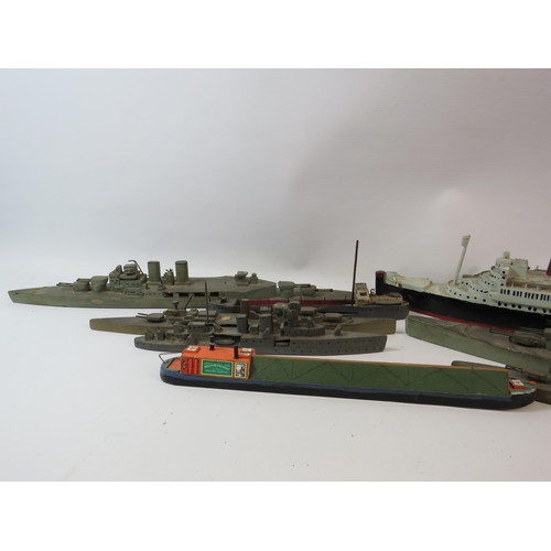 669 - Selection of handmade wooden boats, war ships etc.