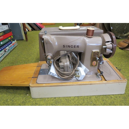 697 - Vintage Singer 185 sewing machine in case with instructions.