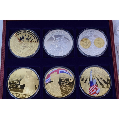 418A - Selection of Gold and Silver plated Cupro Nickel commemorative coins. Presentation box included. See... 