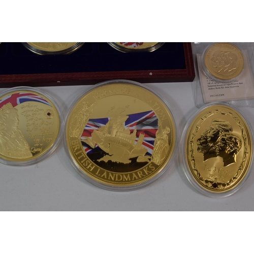 418A - Selection of Gold and Silver plated Cupro Nickel commemorative coins. Presentation box included. See... 