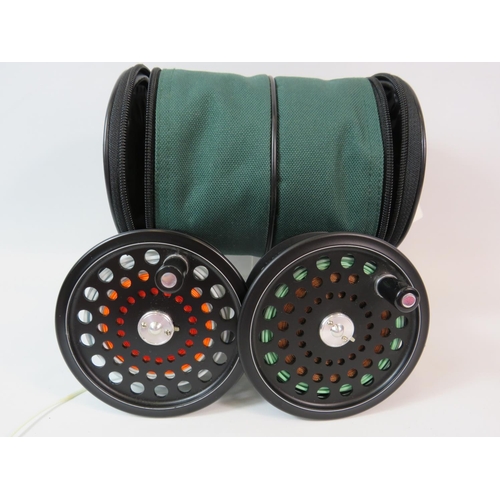 1070 - Two Hardy Ultralight spare spools with line and good quality ABU soft carry case with zip ends.