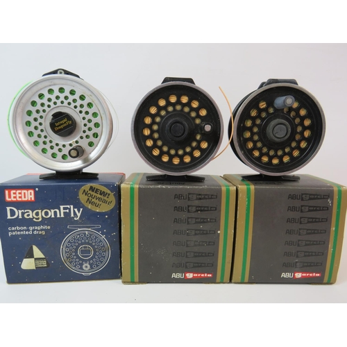 1073 - Leeda Carbon Graphite Dragonfly regular 80 fly reel plus two Abu Garcia Diplomat 278 reels. All with... 