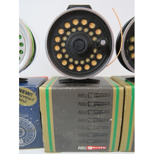 1073 - Leeda Carbon Graphite Dragonfly regular 80 fly reel plus two Abu Garcia Diplomat 278 reels. All with... 