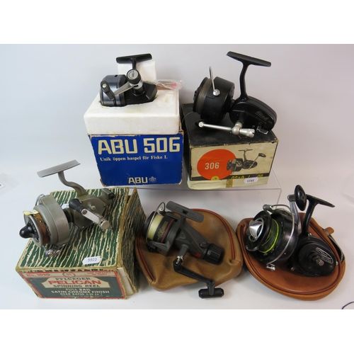 1076 - Abu 506, Mitchell 306, Pflueger Pelican spinning reel, all with original but tatty boxes plus a Mast... 