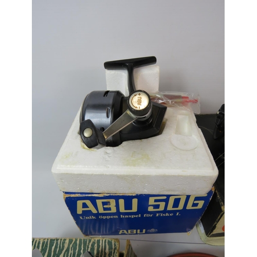 1076 - Abu 506, Mitchell 306, Pflueger Pelican spinning reel, all with original but tatty boxes plus a Mast... 