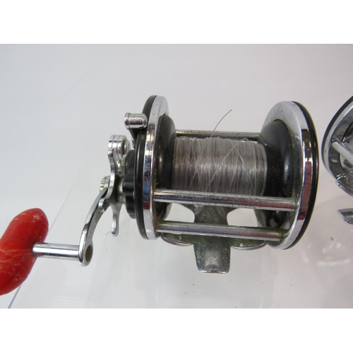 1079 - Penn 160 Sea Fishing Reel  plus a Winfield level wind sea reel. No boxes . See photos.