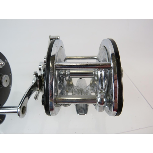 1079 - Penn 160 Sea Fishing Reel  plus a Winfield level wind sea reel. No boxes . See photos.