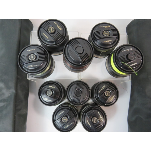 1084 - Eight , Shimano GT3000X Spare spools which come in two Vinyl carry cases. See photos.