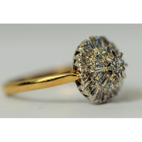 223 - 9ct Gold, Set with Multi Diamonds on a Starburst mount.   Finger size 'P-5'  3.5g