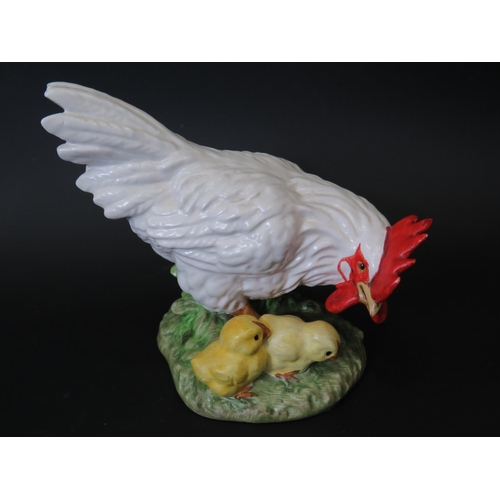 5 - Goebels West German figurine of a Hen with chicks.  Approx 4 inches tall. See photos