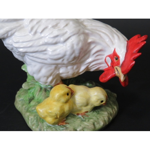 5 - Goebels West German figurine of a Hen with chicks.  Approx 4 inches tall. See photos