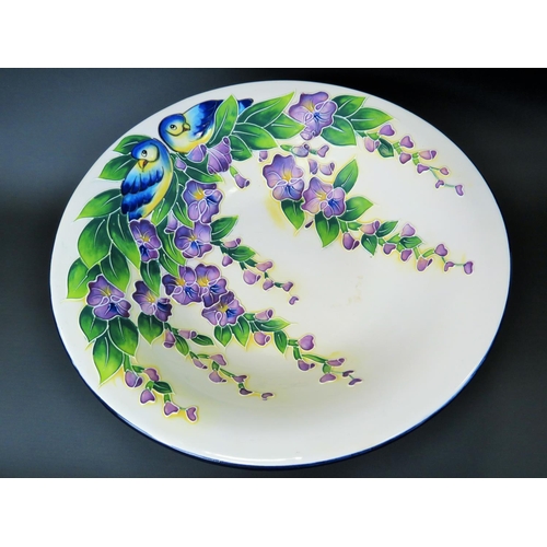 76 - Very pretty footed bowl by Blue Sky 2011 with tube lined decoration of Blue Birds and Hanging Wister... 