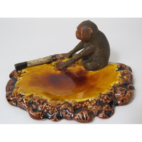 89 - Bretby Novelty ash tray showing a glass eyed Monkey and part smoked cigarette. Mould number 1825 pos... 