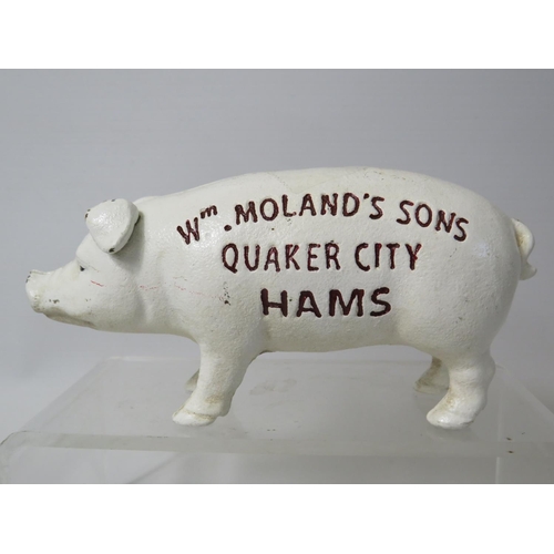 95 - Heavy cast Iron advertising money box as a pig. 7 inches long. See photos.