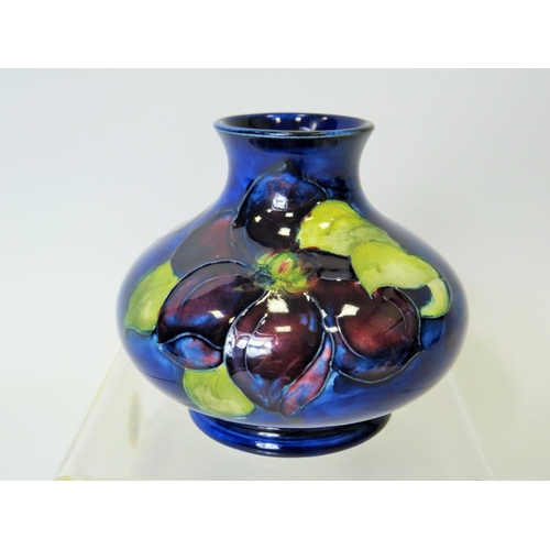 106 - Small Moorcroft vase just 3 inches tall in the Anenome pattern. Excellent condition . See photo.