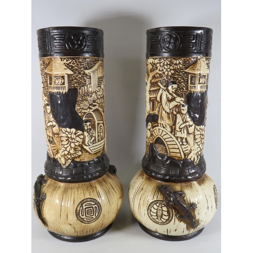 192 - Matchin pair of large Bretby art pottery vases in a oriental design approx 14.5