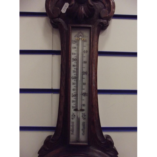 401 - Early 20th Century Barometer,/Thermometer, patent number 16538 .Carved Oak case measuring 34 inches ... 