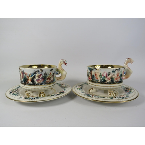 2 Capodimonte cups and saucers.