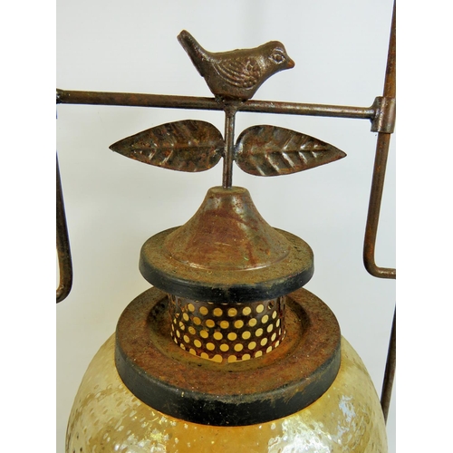 784 - Indian made large Church candle lantern with pressed glass shade, metal constuction. 24 inches tall.