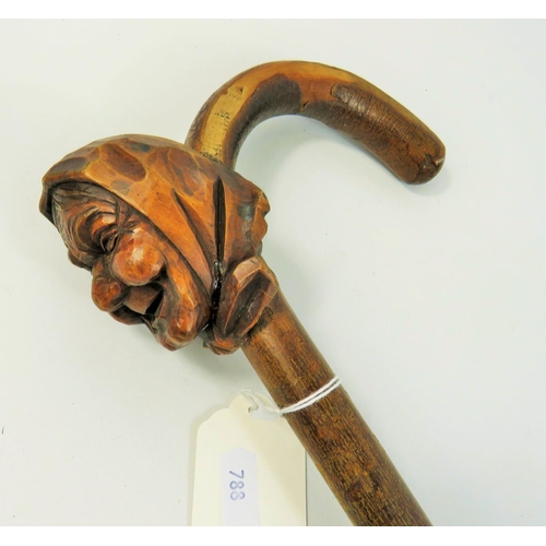 788 - Natural bentwood cane embellished with a carved head of an old woman. See photos.