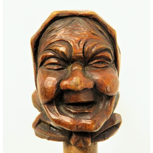 788 - Natural bentwood cane embellished with a carved head of an old woman. See photos.