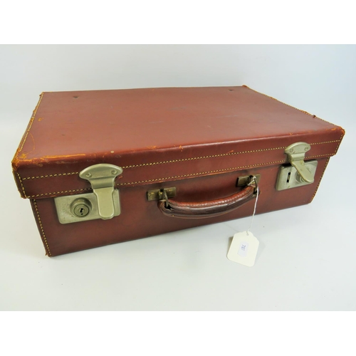 789 - Vintage Leather Evacuee style suitcase. See photos