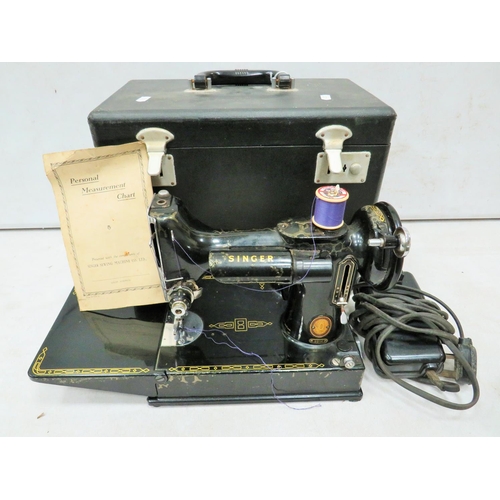 791 - Singer 221K Electric portable sewing machine with original case. See photos