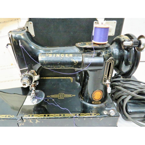 791 - Singer 221K Electric portable sewing machine with original case. See photos