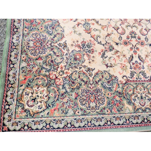 1038 - Large wool patterned carpet approx 7ft X 9ft see photos.