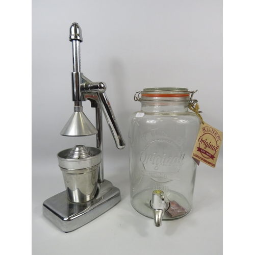 131 - Stainless steel juicer and a large Kilner juice dispensing jar.