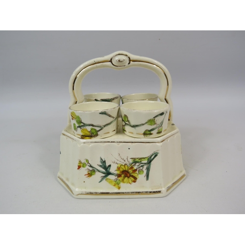 152 - Vintage ceramic 4 egg cup cruet set in a basket.