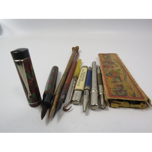 621 - A Burnham fountain pen with glass nib and a selection of vintage pencils etc