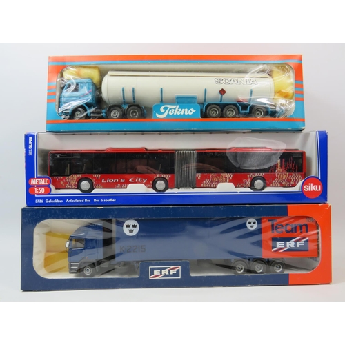 750 - Three 1-50 Scale Die Cast Trucks and Buses. Average length 13 inches. All boxed and unused. See phot... 