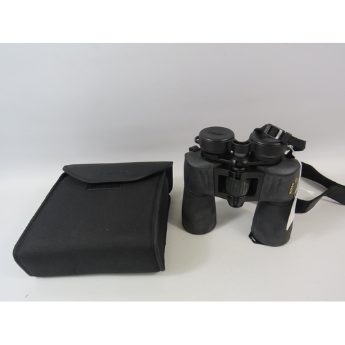 854 - Nikon action ex 7 X 50 binoculars and case.